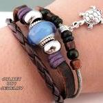 Silver turtle charm leather..