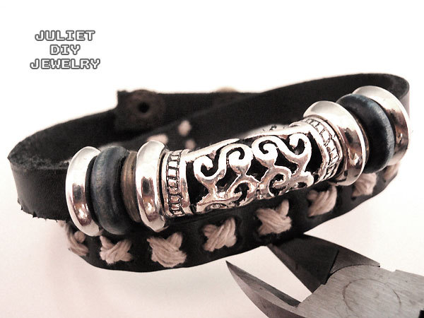 Black leather double wrap bracelet with ancient looking silver tube