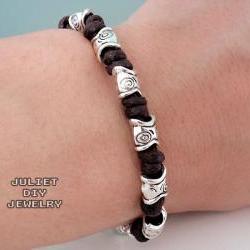 Tribal style silver fish bead hemp bracelet