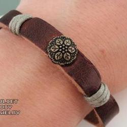 Simple leather bracelet with brass flower button